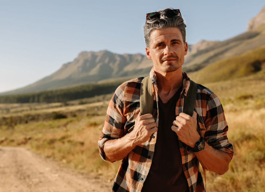 Image of a 55 year old casual patient dressed as a backpacker
